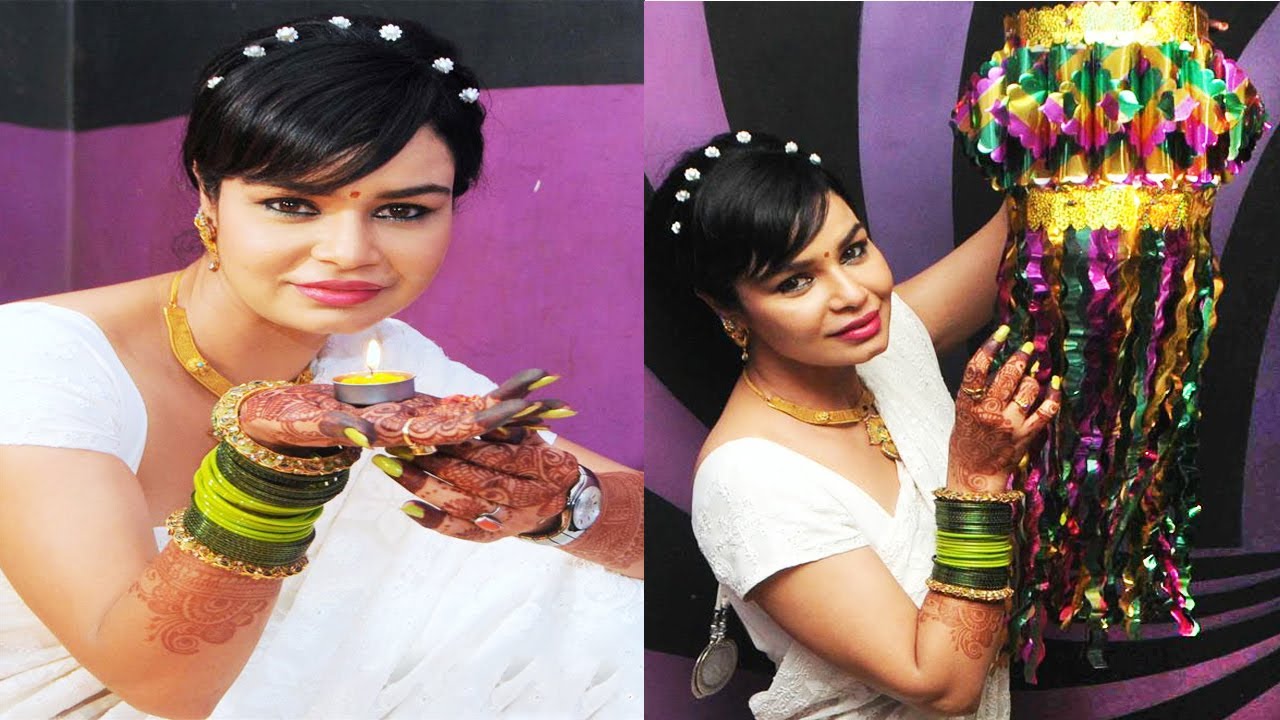 Sexy Kavita Verma Diwali Photoshoot With Diya & Crackers In White Saree