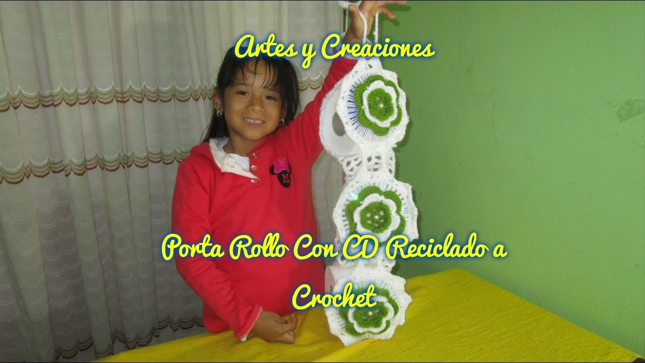 PORTA ROLLO CON CD RECICLADO A CROCHET.