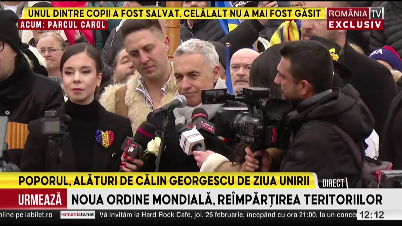 Calin Georgescu da drumul la porumbei in Parcul Carol