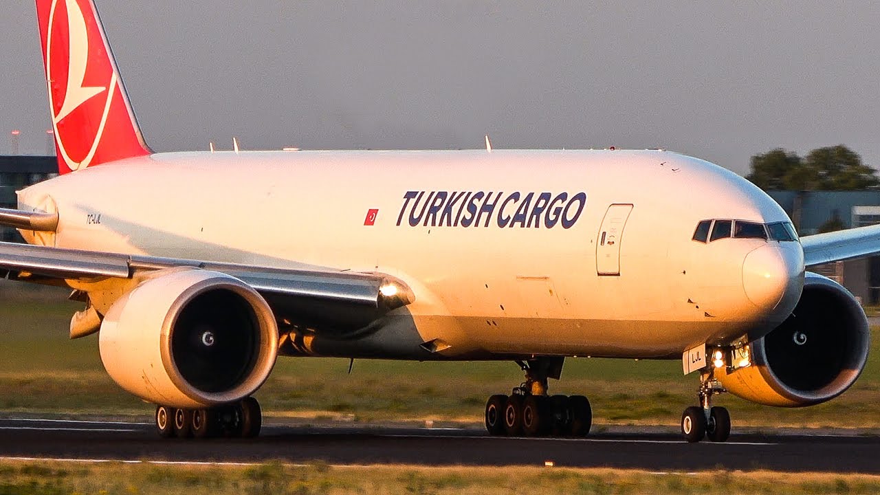BOEING 777 DEPARTURE with VISIBLE WINGFLEX SHADOW - B777 Freighter during SUNSET (4K)