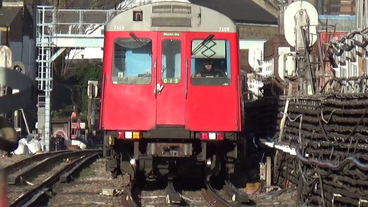 London Underground D Stock 7509 and 7078 arriving into Barons Court
