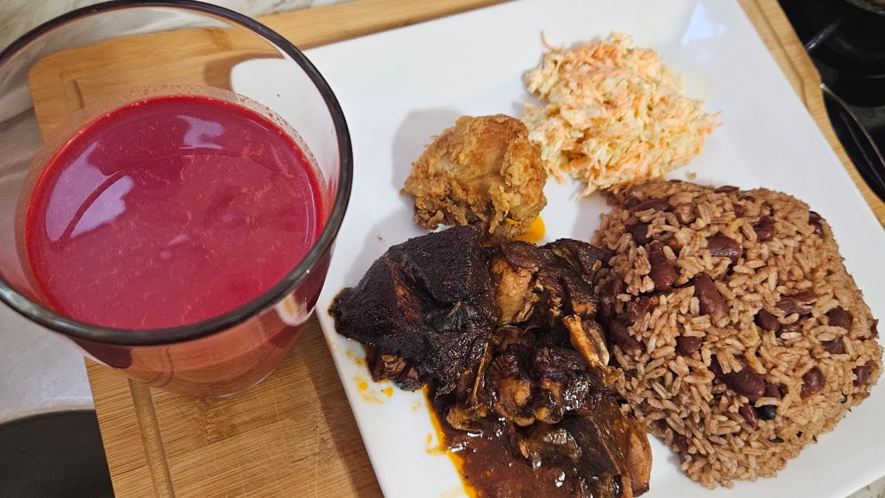 Stew Pork and Fried Chicken with rice and Peas and coleslaw ft. Carrot and beet root juice