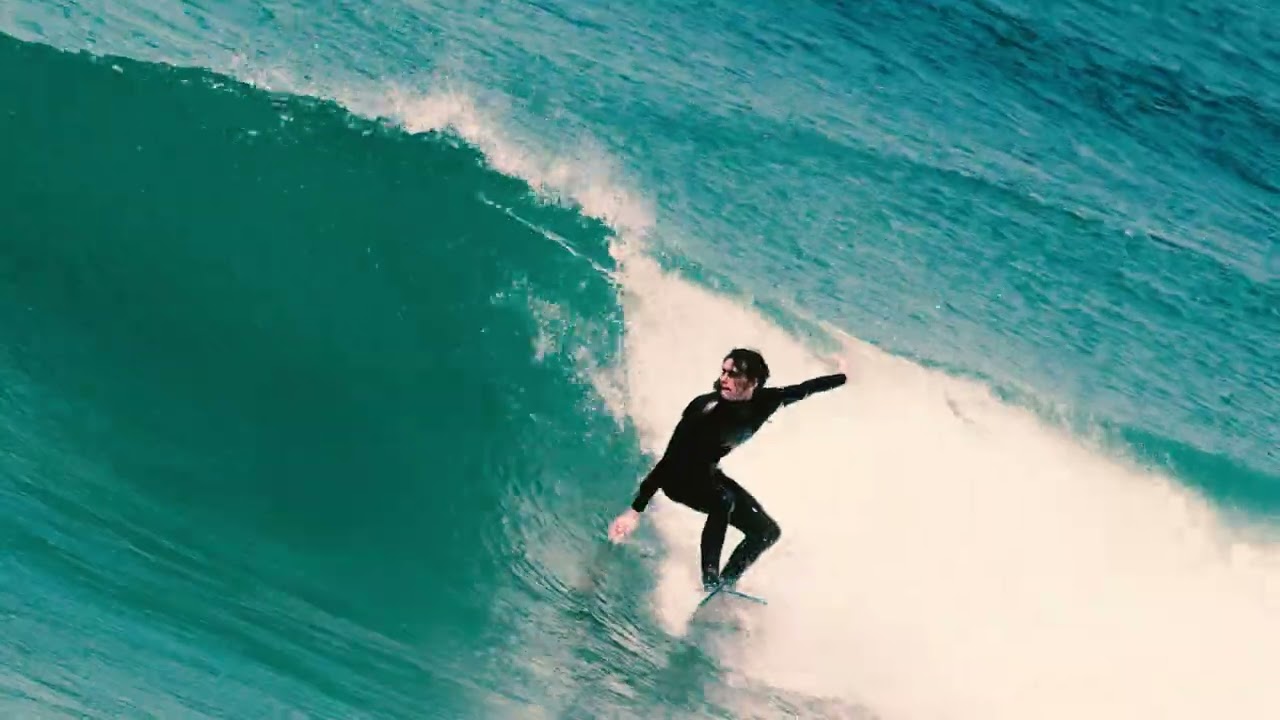 RIVER MOUTH SURFING IN THE DEEP SOUTH OF NEW ZEALAND.
