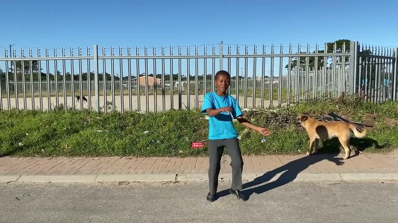 Born in Africa kids dance to Joanna with volunteer Jits