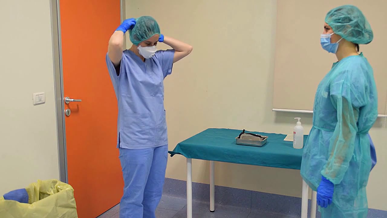 CORONAVIRUS COVID-19. Procedure to assist patients. Wearing Personal Protective Equipment (PPE)