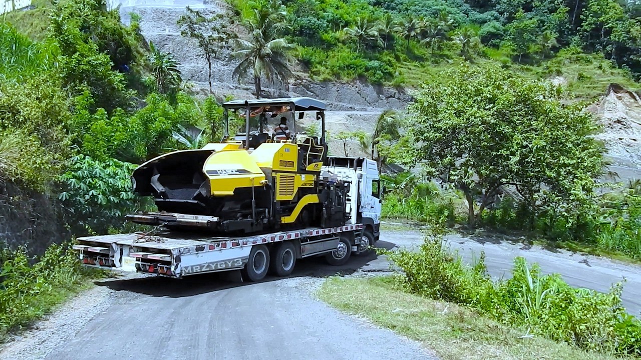 8x4 Heavy Haul Truck: The Ultimate Test of Skill on Narrow Mountain Curves Moving Paver HA90C