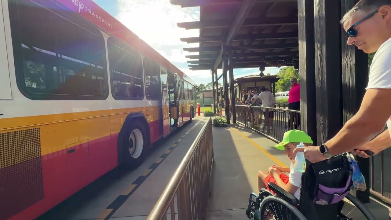 Kayden off Disney Mickey Bus at Animal Kingdom Bus Stop #bus #mickeymouse #busstand #animalkingdom 