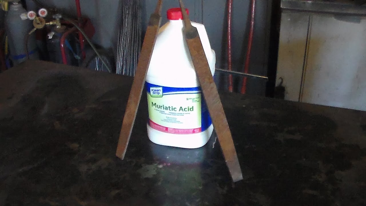 Sharpening a file using acid
