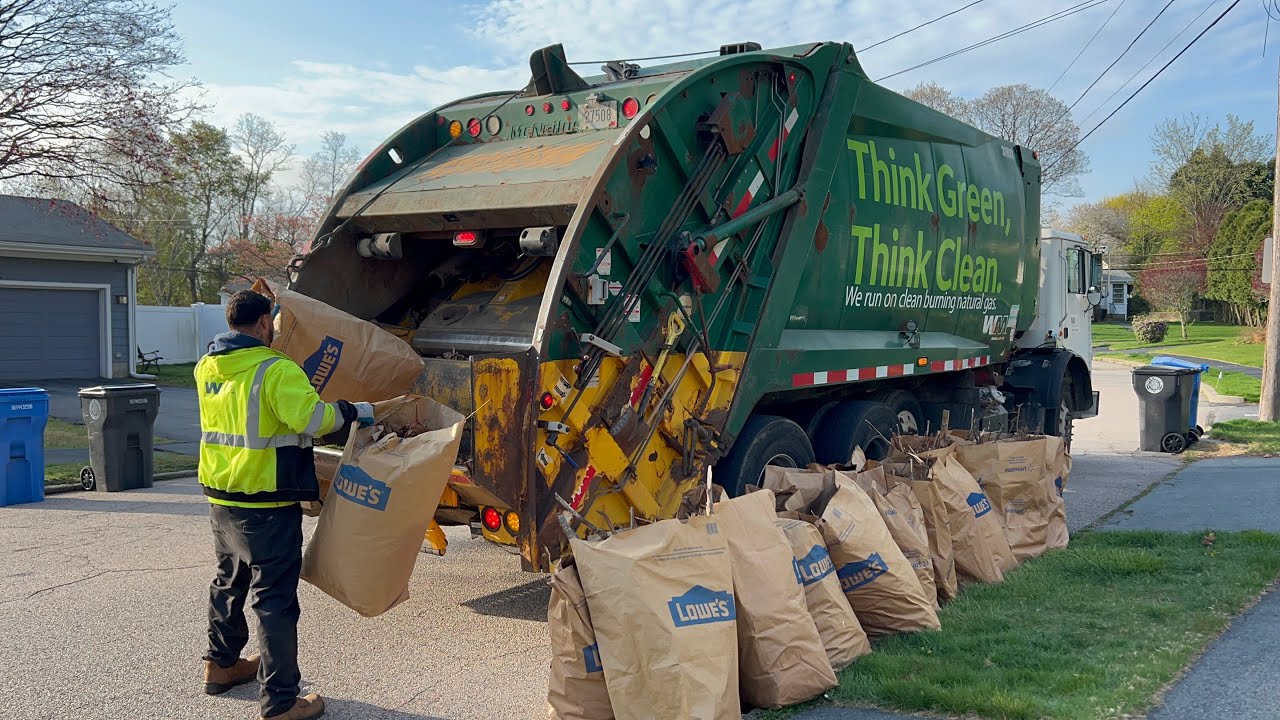 WM Garbage Truck Packing The First Yard Waste Of 2023
