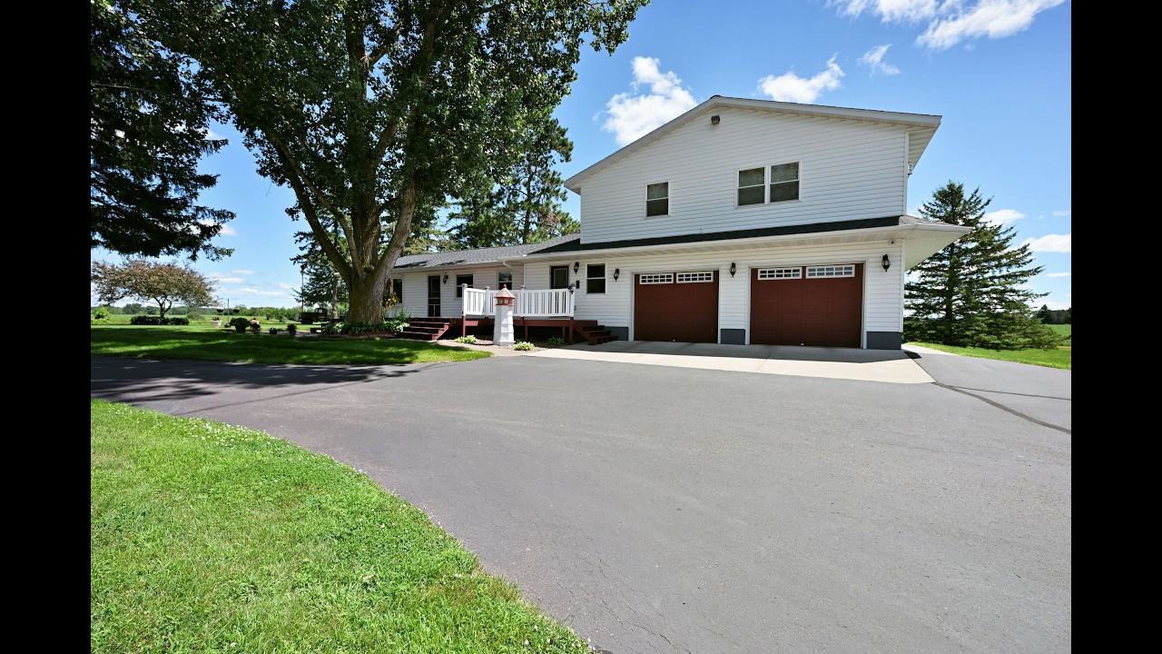 4 Bedroom Home on 5 Acres, with a Private Pond & Incredible Heated Shop - Rice Lake, WI