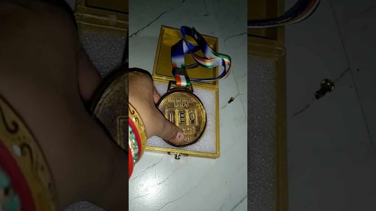 My son international English Olympiad Rank 1 ke ata he . Gold medal 🏅 or cirtificate milega