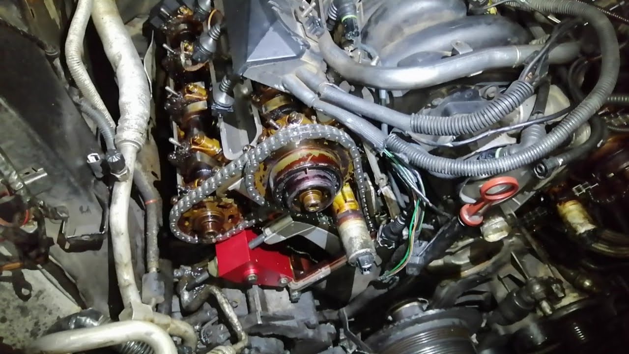 Sincronizar cadena BMW X5 motor 4.4 con códigos de error P0011 y P0021 paso a paso con herramienta