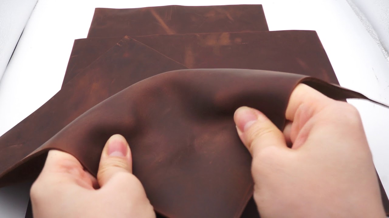 Crazy horse leather sheet in dark chestnut. very strong oil tanned pull up leather piece