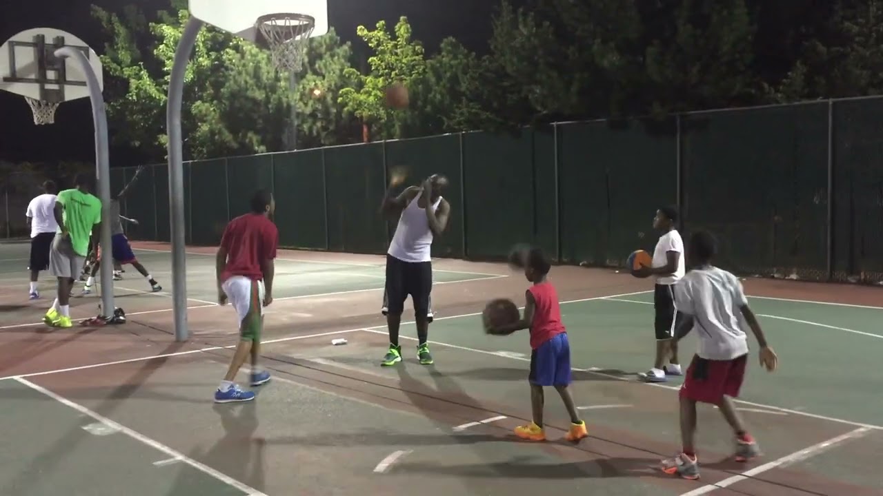 Abdou toure early days on the court with his little brother.