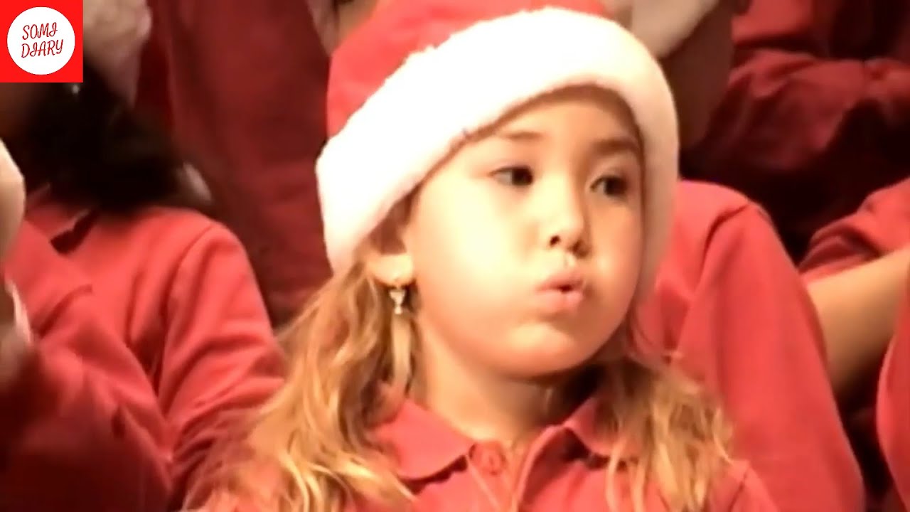 Baby Jeon Somi opening her gifts and singing in choir