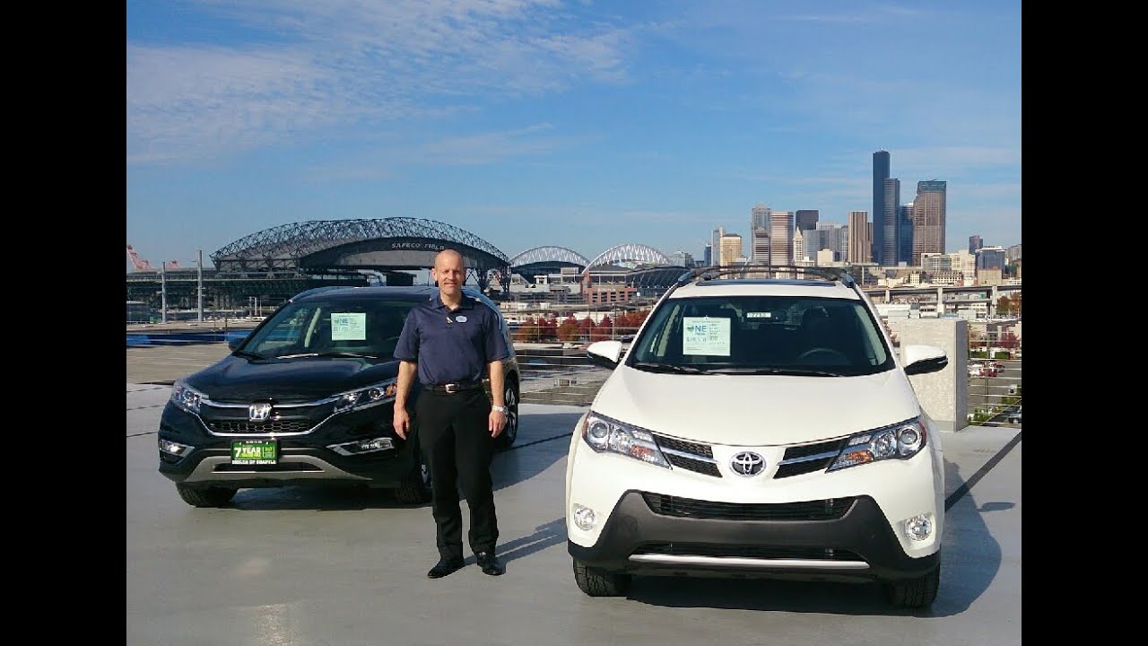 2016 Honda CR-V Touring AWD vs. Rav4 Limited - we review both, but only get to choose 1 winner.