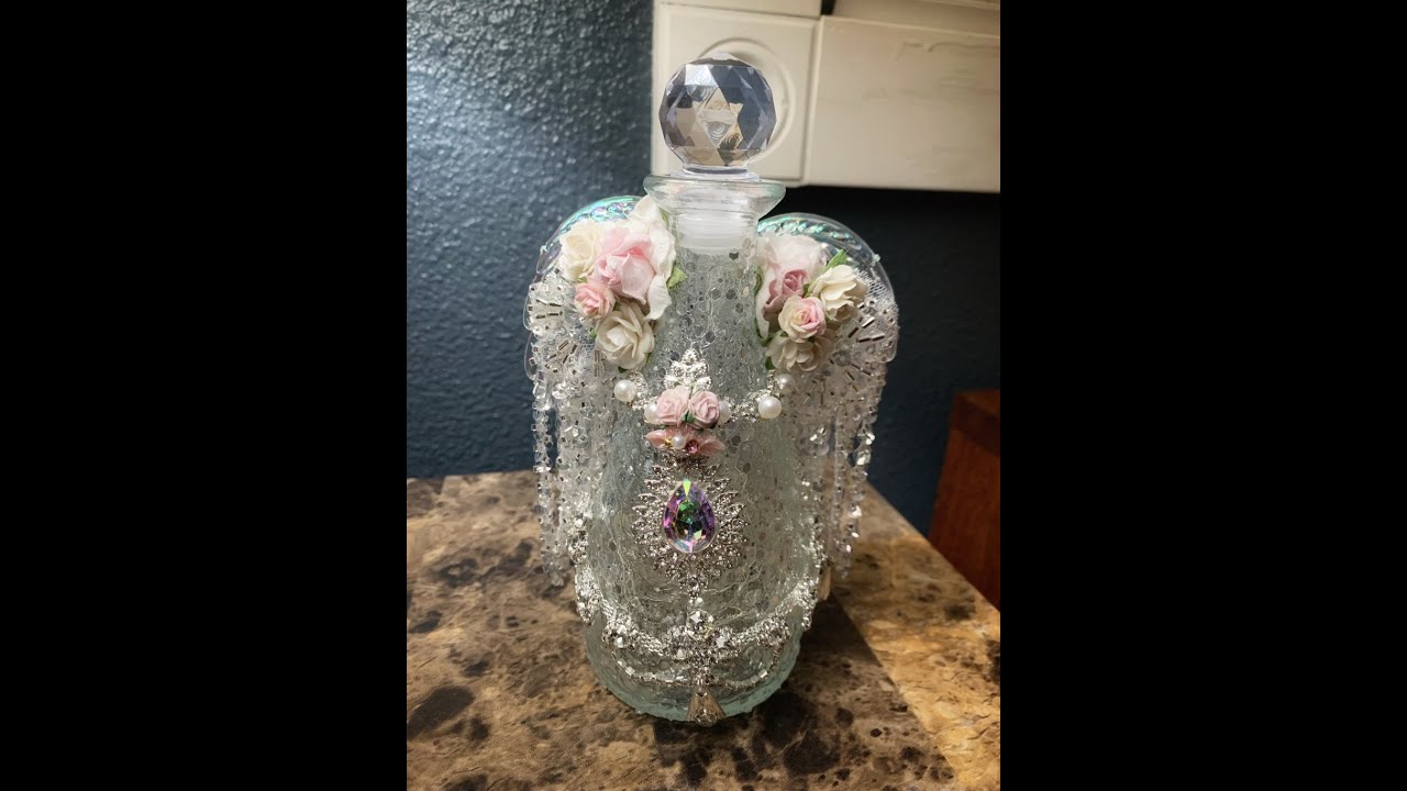 Learn to make this Glass Bottle Angel by: Refunction Crafts