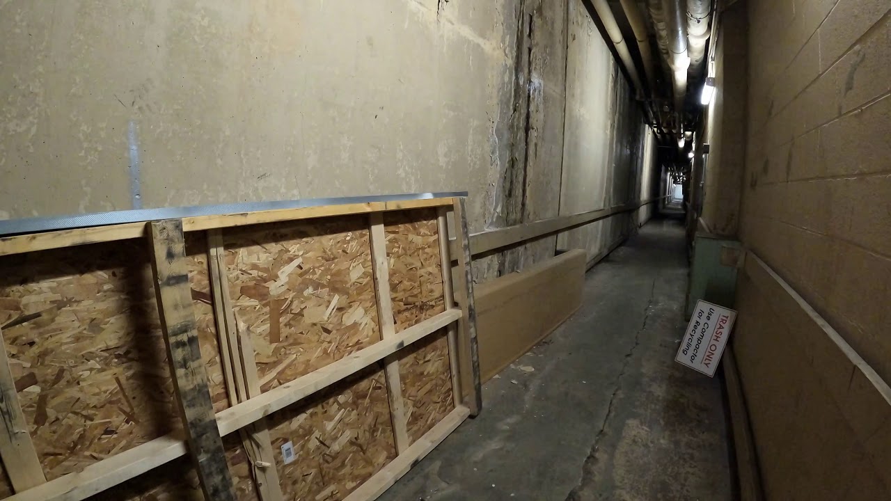 Walking Through Mall Fire Exit Hallways