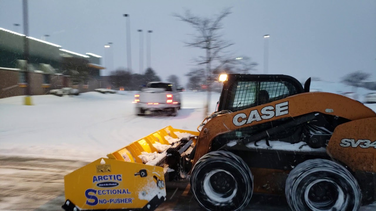 Pushing Snow Arctic Sectional LD10 Skid Steer