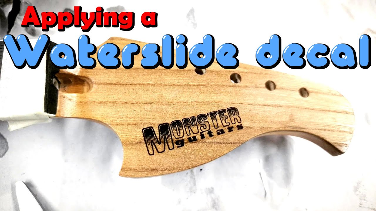 Finish neck and apply waterslide decal to the headstock