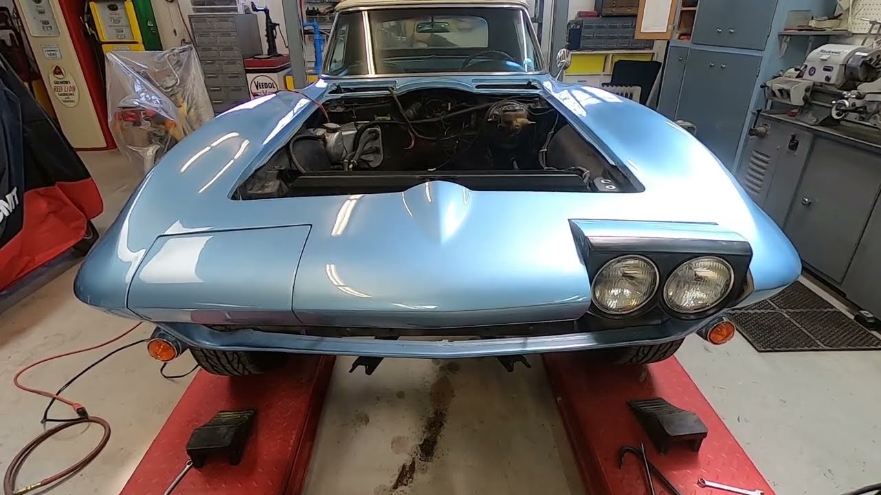 How to remove headlight doors/ buckets from C2 Corvette