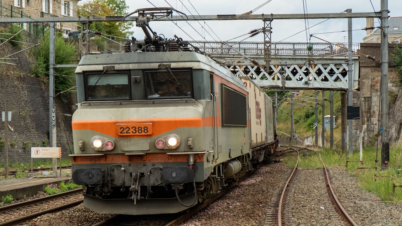 Classic SNCF BB 22200 with freight train slowing down for the passage through the station of Vitr&eacute;