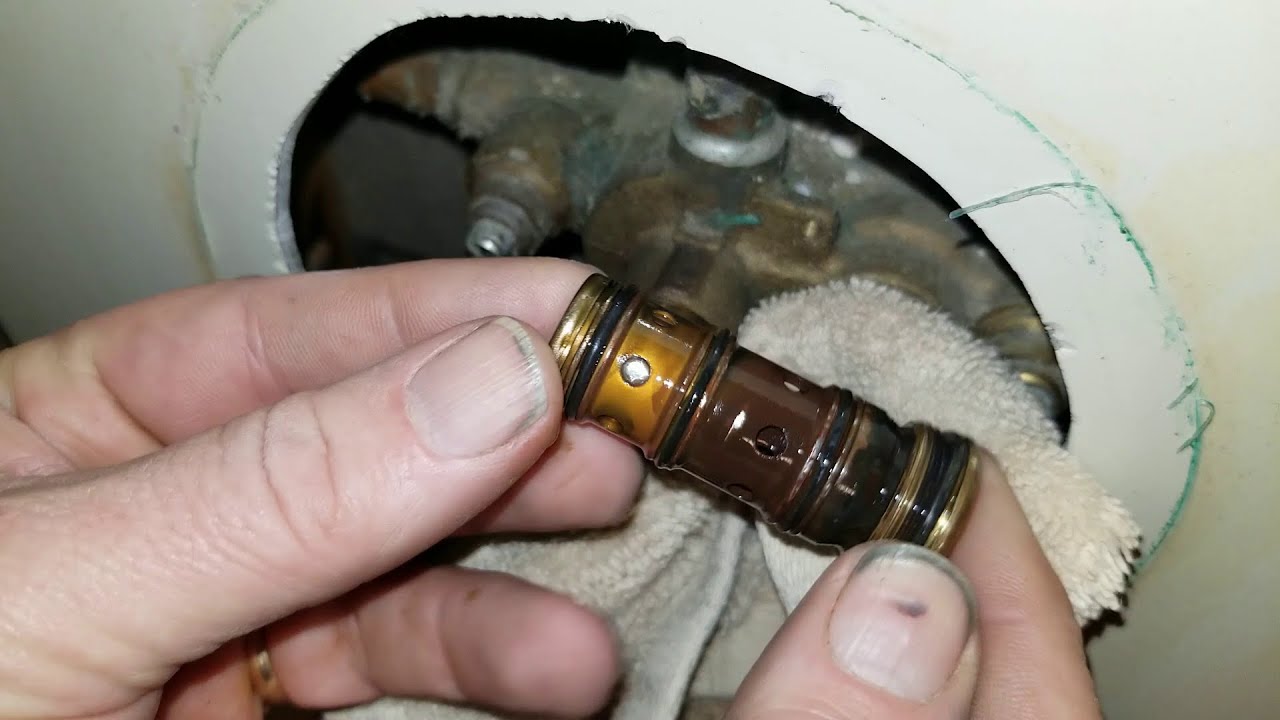 How to Remover a 1423 Balancing Spool from a Moen Moentrol Shower Valve