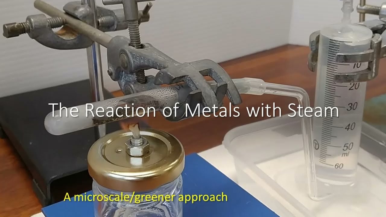 Zinc and iron reacting with steam