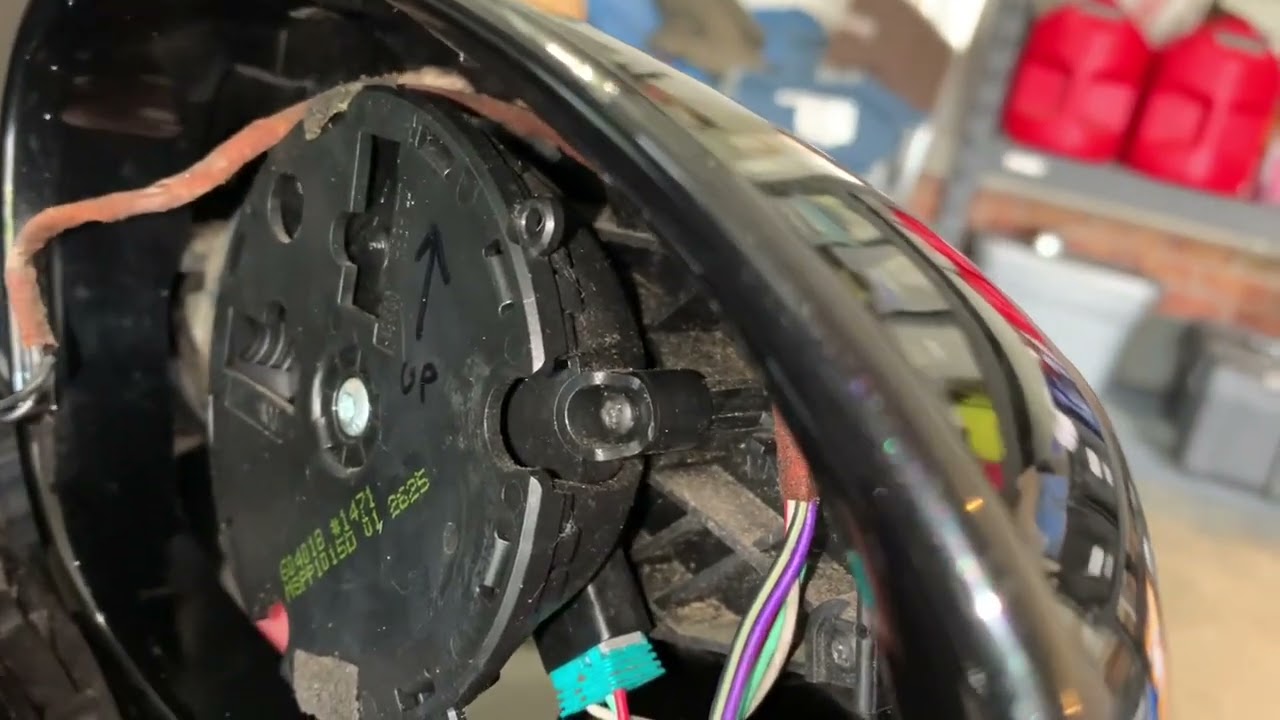Remove/Replace BMW side mirror glass. 2006 Z4 E85