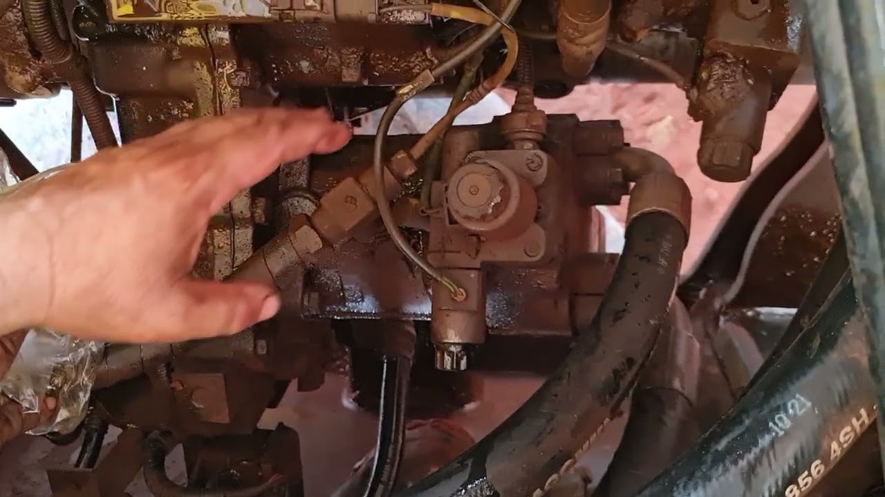 Explicação de como funciona o sistema hst da Pá Carregadeira Komatsu WA200 5 com o Júlio César