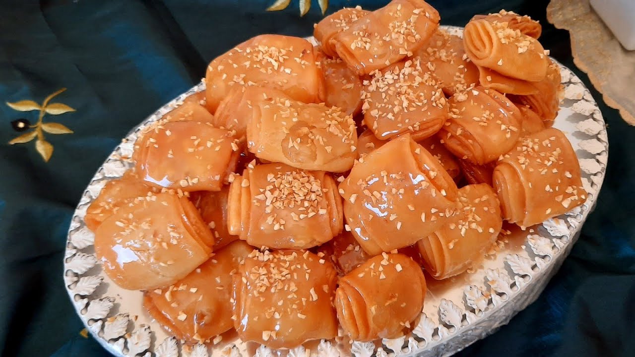 رغيفات العيد معسلين بدون بيض من اروع والد مايكون بطريقة سهلة ومكونات بسيطة وكيبقاو مقرمشين مدة طويلة