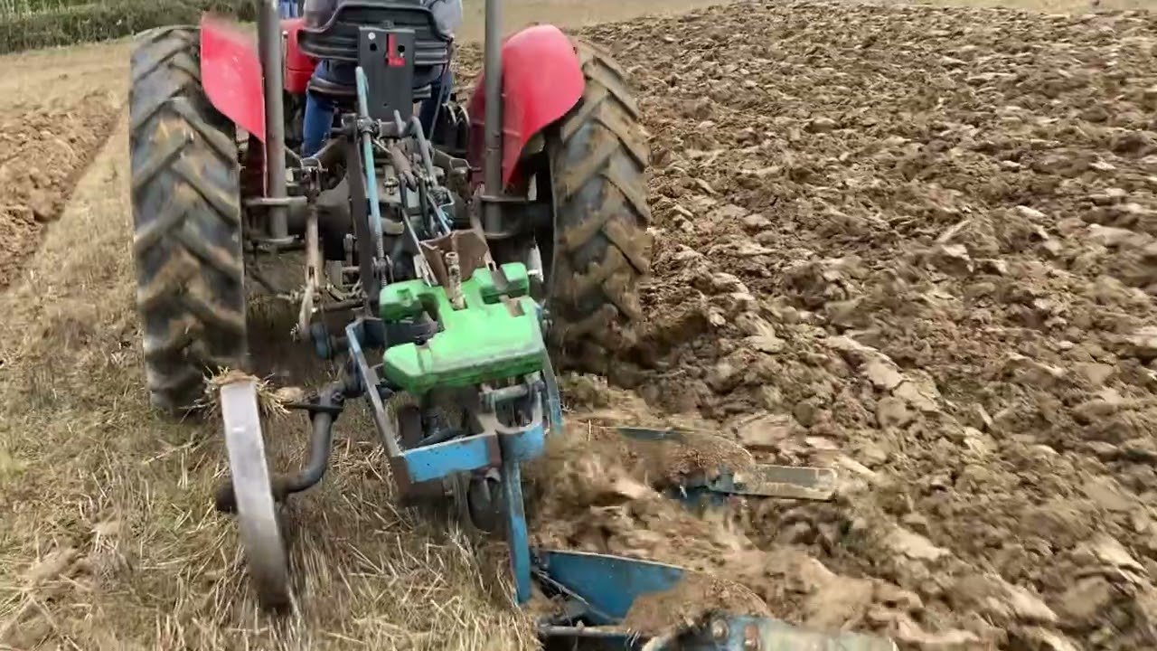 Massey Ferguson 135 with ransomes robin plough