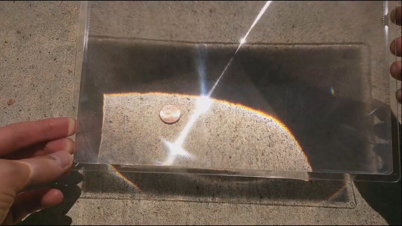 Melt a Penny with the Sun and a Fresnel Lens - (magnifying glass)
