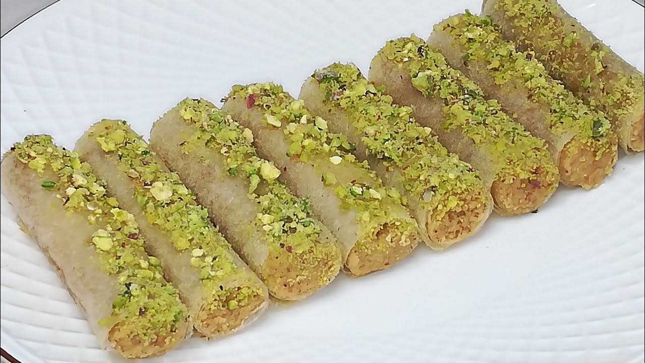 محنشة تونسية بالحمص و الفاكية 🇹🇳mhancha tunisienne au pois chiches et fruits secs/m7ancha 🌙حلويات