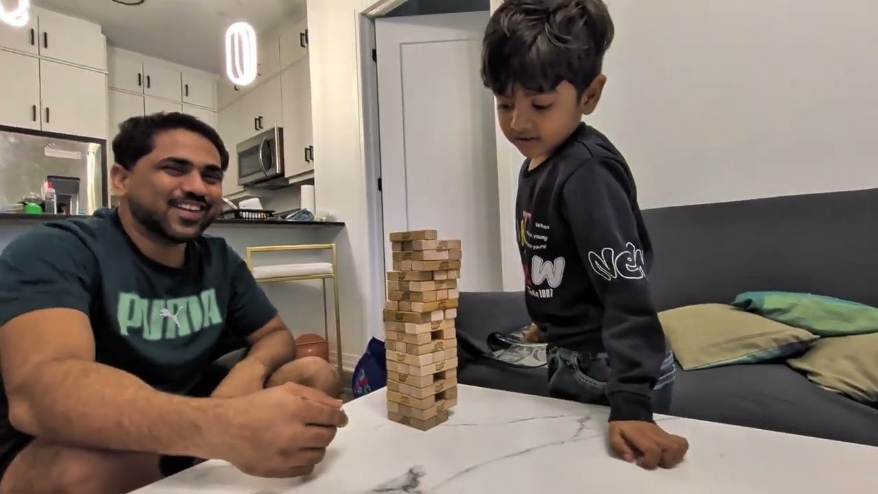 Fun between Father and sons in Jenga game