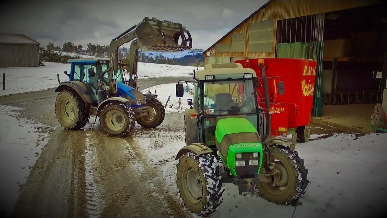 [Drone] Désilage sous la neige (silo-boudin) – Deutz Fahr Agroplus 315 – RMH VR 12 – Valtra n103