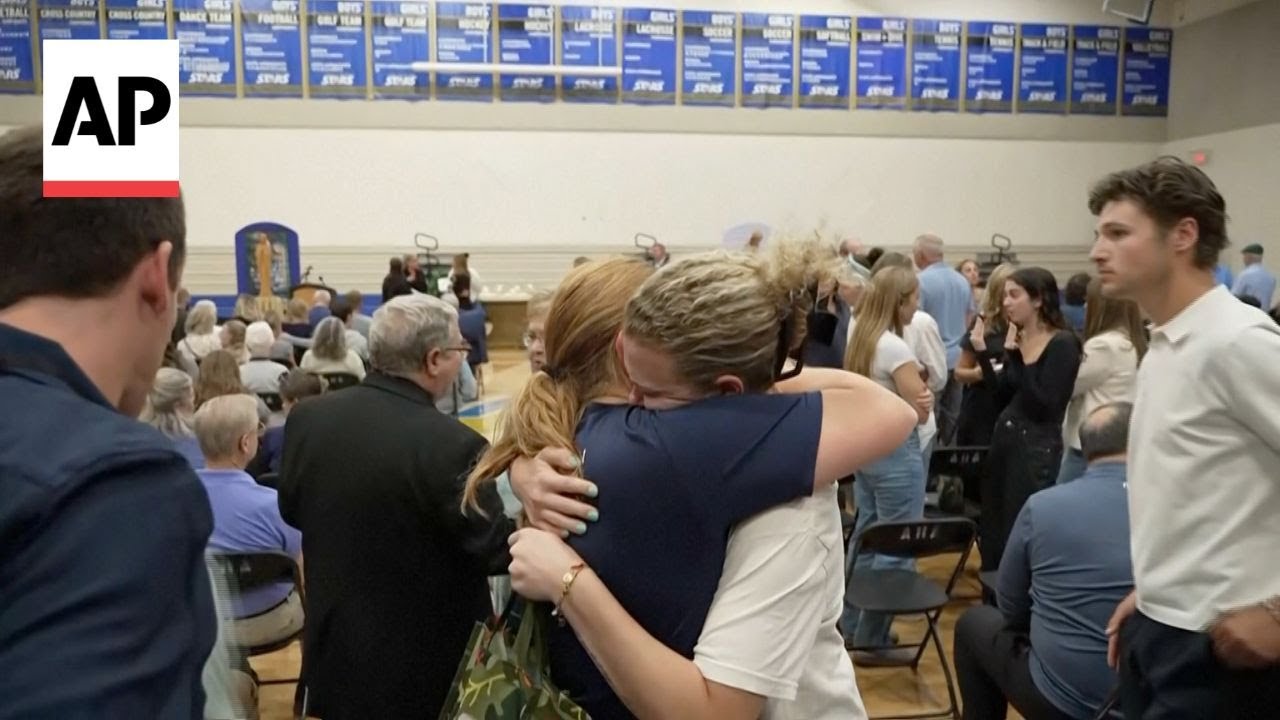 Hundreds pray at vigil for Minneapolis school shooting victims