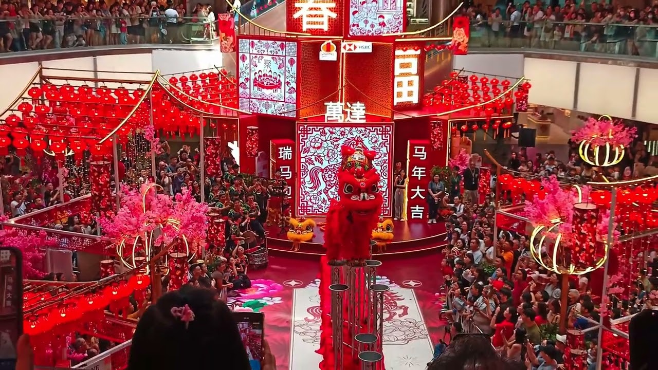 Acrobatic lion dance, strength, agility, and tradition in dynamic motion