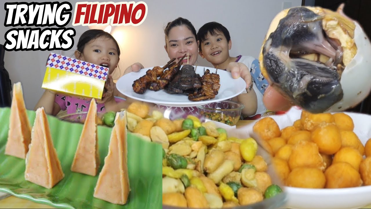 Trying FILIPINO Snacks Bini Edition | kwek kwek isaw balut