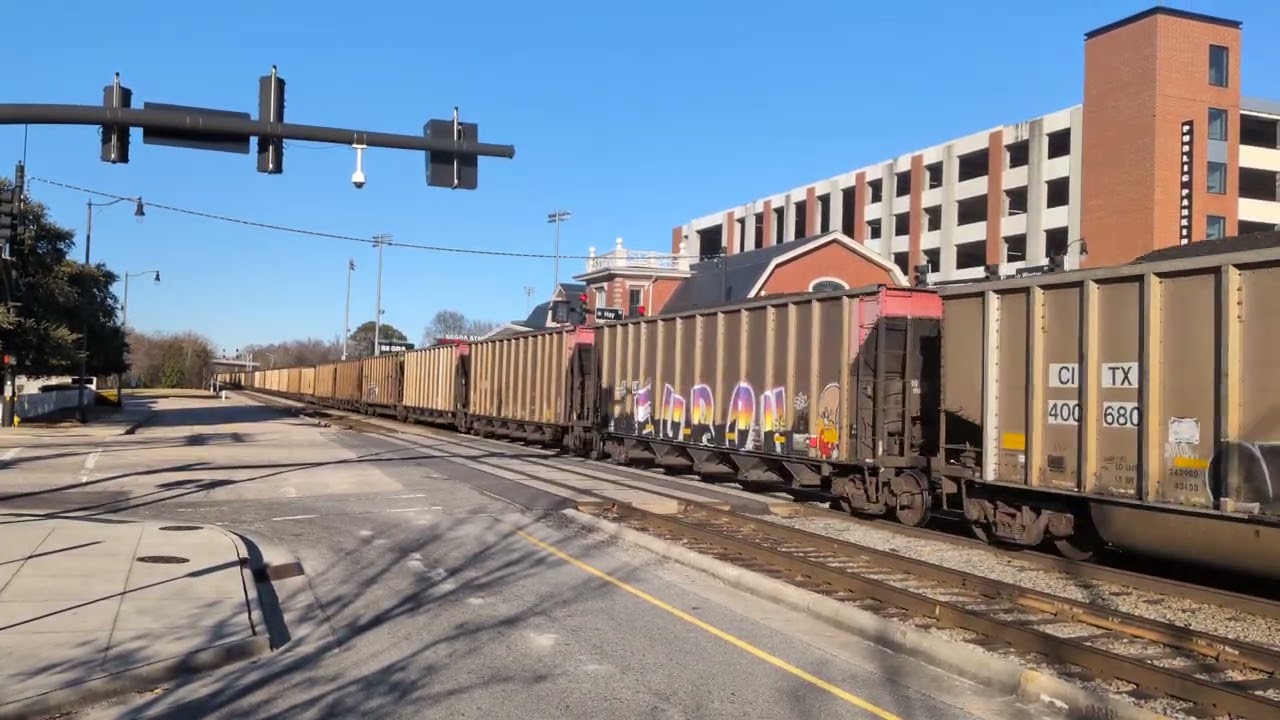 CSX 3206 leads a fully loaded coal train through downtown Fayetteville with CSX 514 trailing 