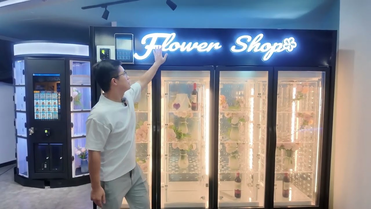 Check out WEIMI new arrival. A huge full transparent flower vending machine shop.