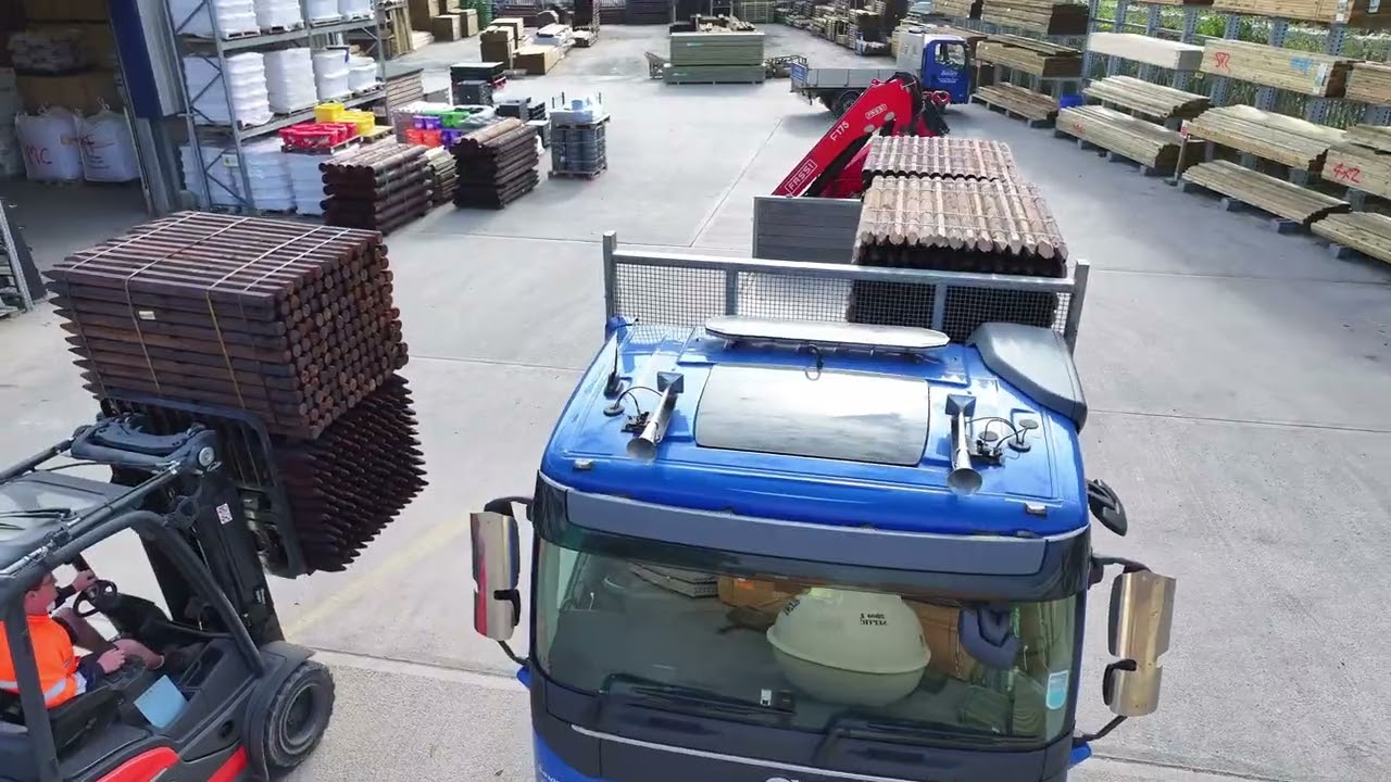 Walter Bailey (Par) Ltd - Volvo FMX WB61 LEY - Being loaded with Creosoted Octo Posts for Delivery