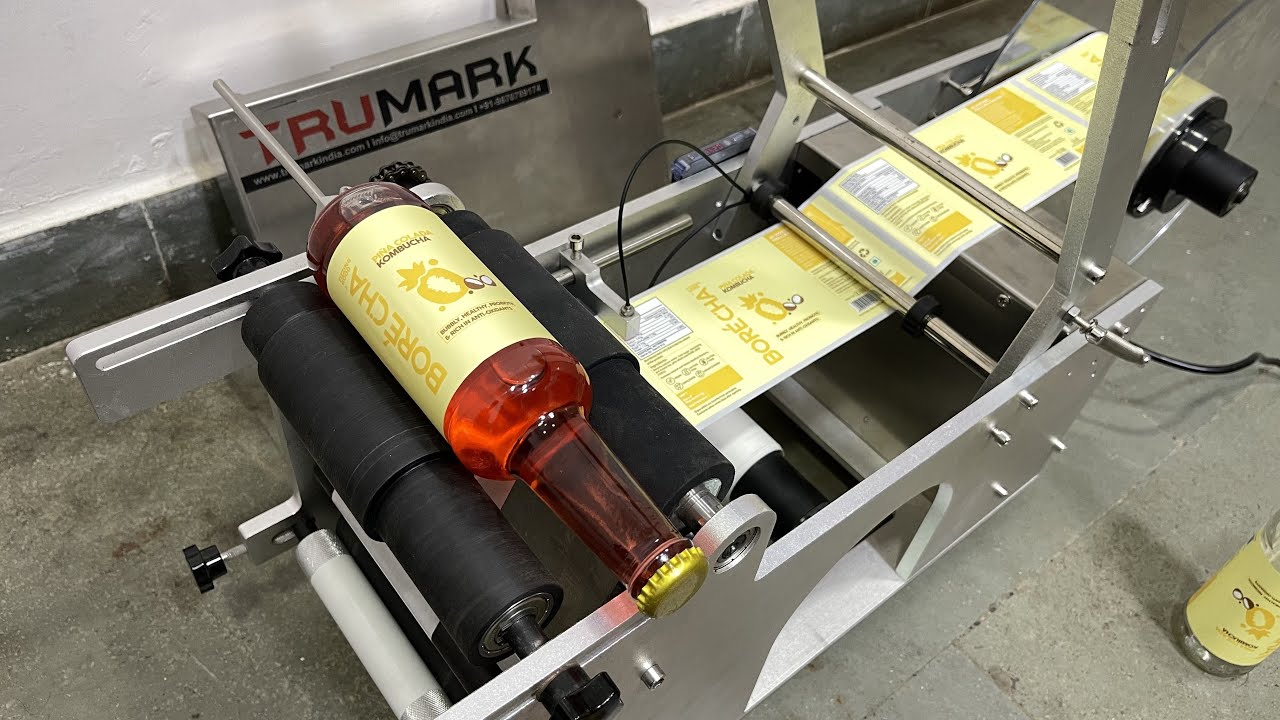 BREEZER BOTTLE LABELING MACHINE