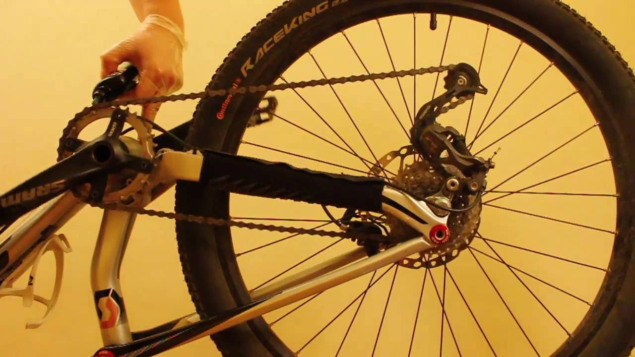 Cleaning a bicycle chain with WD-40 and then relubing it