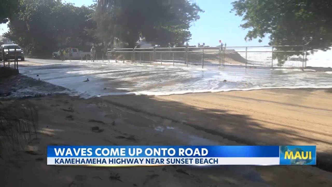 Massive North Shore swell pushes sand and water onto Kamehameha Highway