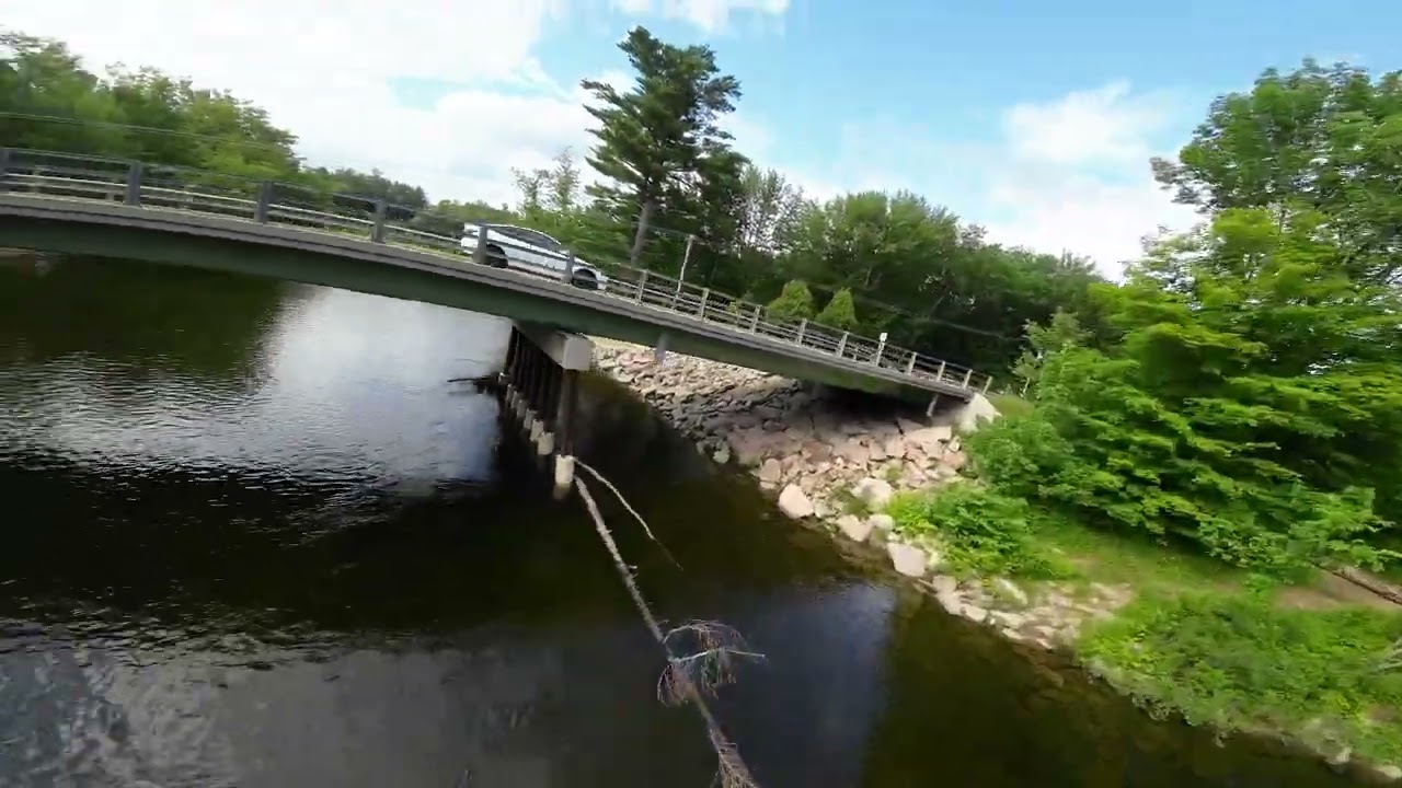 big field next to a river in north conway NH