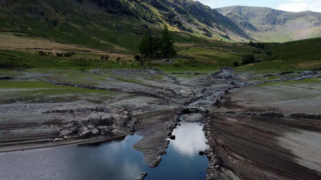 Haweswater Dam Reveling Old Bridge, drone explores 04/08/2021. SD, HD 4K.