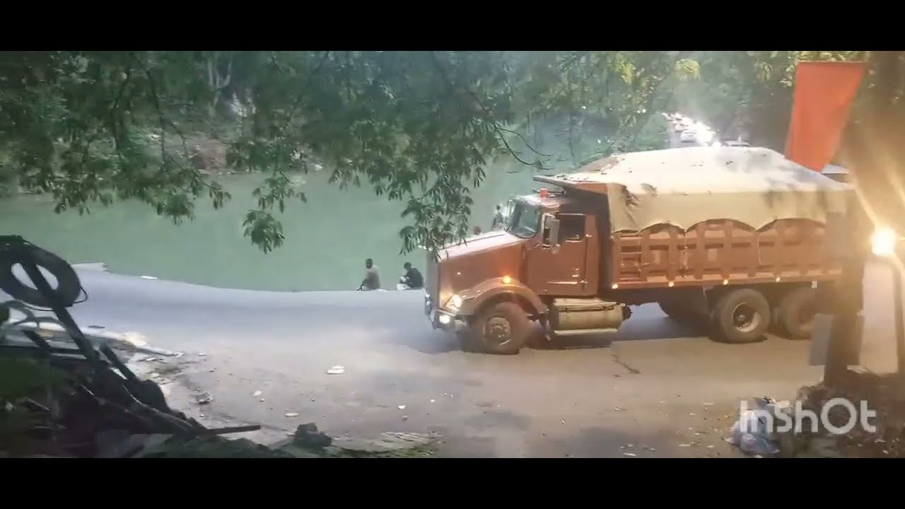 trucks going across the most dangerous bridge in Jamaica #flatbridge