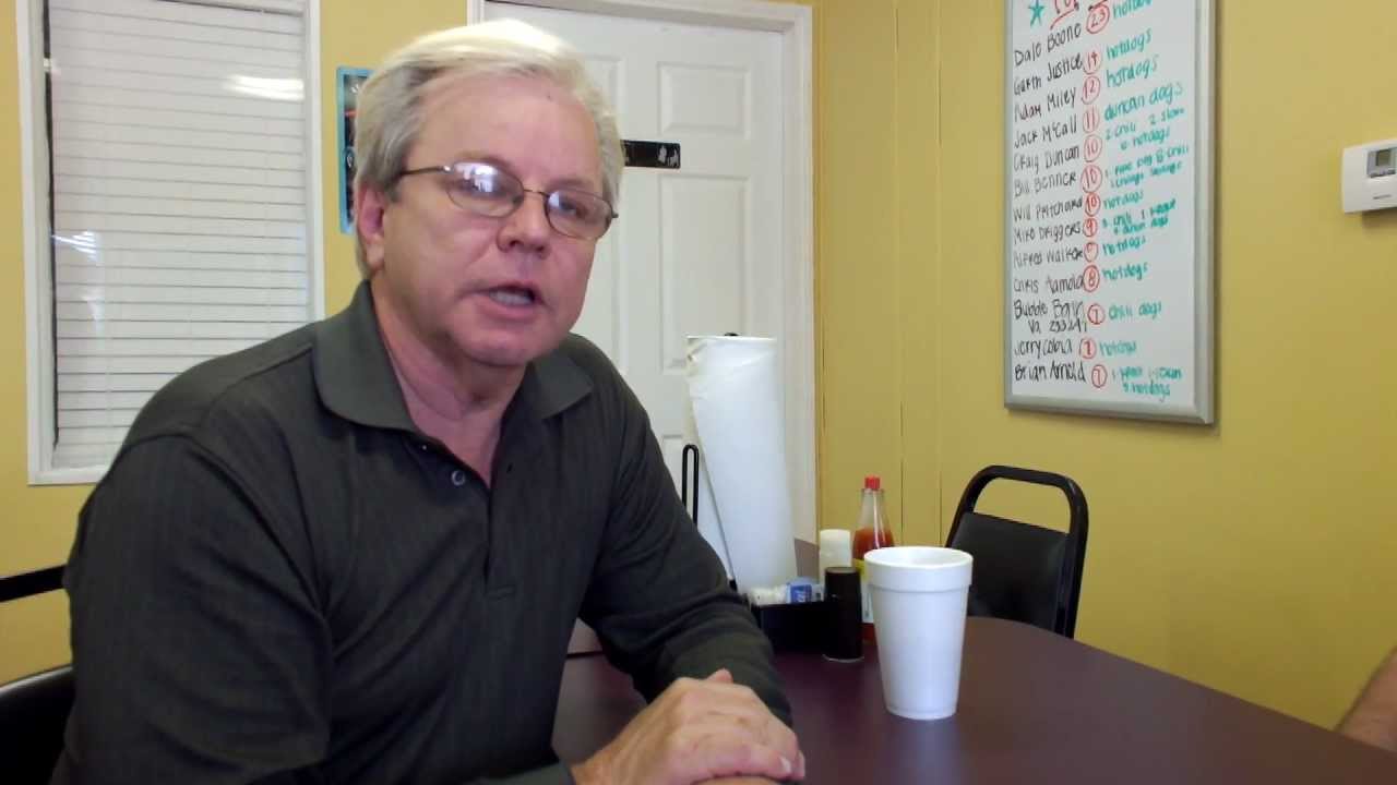 Eddie talking with local business owner Monte Duncan