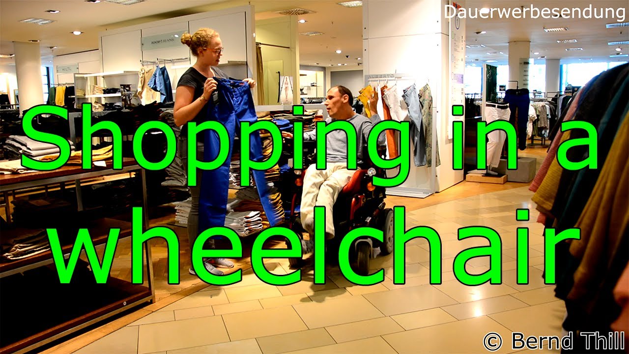 Im Rollstuhl eine Hose kaufen - Mit Spastik shoppen (Man with spasticity buys a pair of pants)